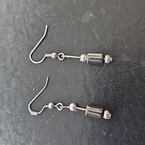 Pair of gray and silver dangle earrings